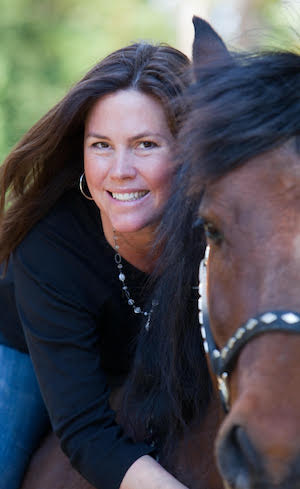 Laura Munson, author of "Willa's Grove" on her horse | Photo given to The Women's Eye by Laura Munson
