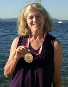 Lynn Sherr, ABC broadcaster, and swimming medal