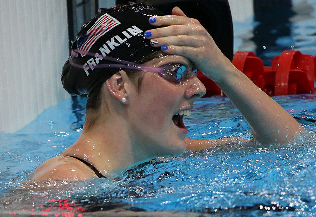 Missy Franklin, 17-year-old swimmer reacts when she wins Olympic Gold | Photo: Robert Gautheir