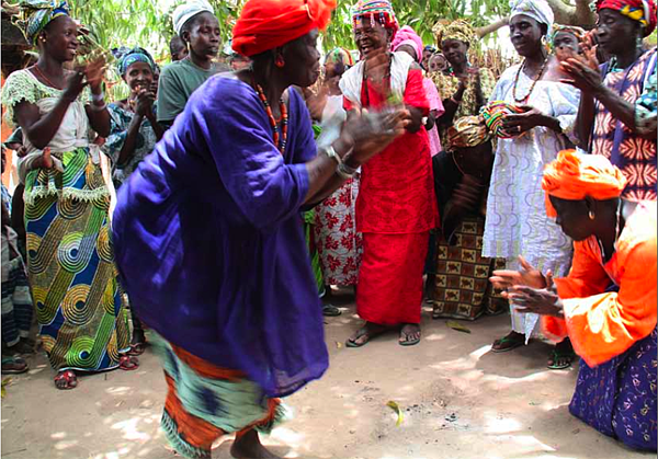 Midwives in Senegal dancing with their granddaughters | From "Grandmother Power" by Paola Gianturco, published by powerHouse Books.