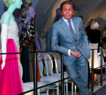 Valentino posing on the catwalk of his exhibition