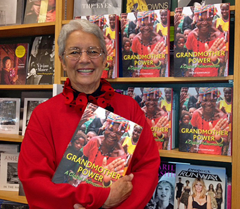 Paola Gianturco with her book, 'Grandmother Power, A Global Phenomenon' on Book Launch Day