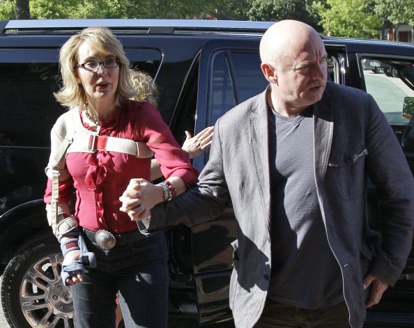 Gabby Giffords and husband Mark Kelly in New Hampshire 7/5/13/Photo: Mary Schwalm