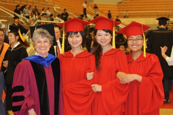 Jerrie Euberle, founder of World Academy for the Future of Women with recent women graduates