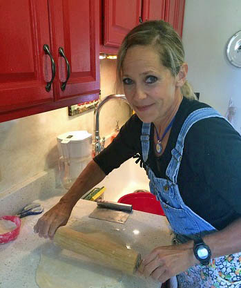 Beth Howard rolling dough for 4th of July pies/Photo: Daniel Broten