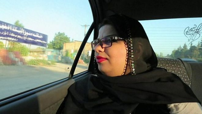 Woman returns home to Halabja/Photo: from BBC.com
