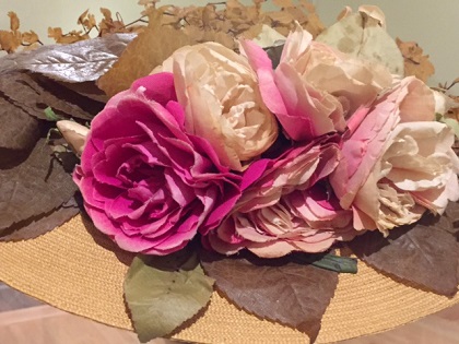 Flower straw hat by Maison Virot, plaited over wire frame, silk artificial roses and ferns ca. 1900 at Legion of Honor/Photo: Courtesy Wendy Verlaine