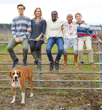 Marika on her farm with Jonas, Wini, Beck, Sophia and their dog