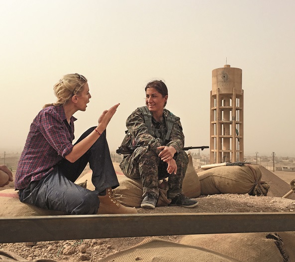 Clarissa Ward, CNN's chief international correspondent, with Kurdish female fighter in North-Eastern Syria, 2015/Courtesy Adam Dobby