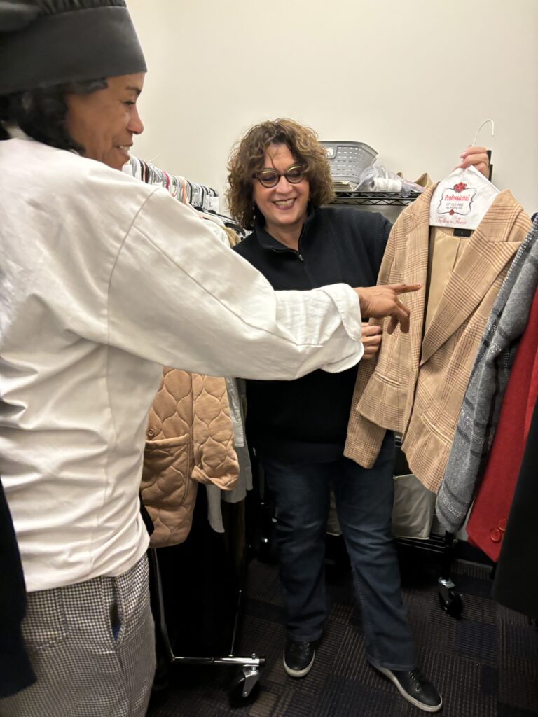 Debbie Isaacs, founder of the nonprofit UNSHAKEABLES in Las Vegas, showing client potential wardrobe/Photo: Courtesy Debbie Isaacs