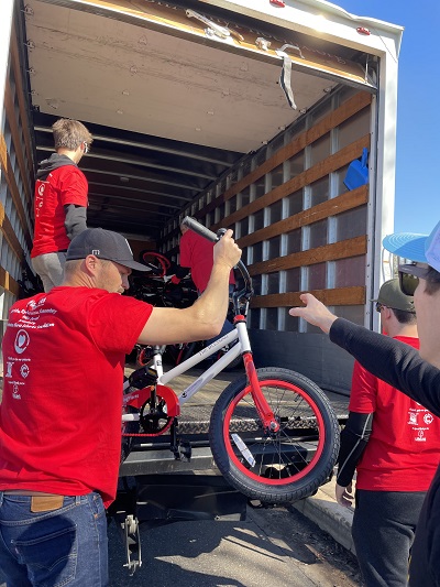 Bikes being unloaded at Hartford Elementary School Chandler AZ for the reveal done by Going Places/Photo: P. Burke