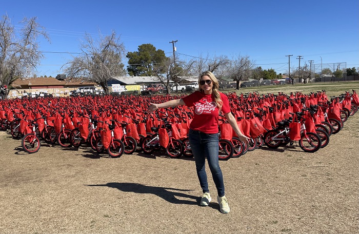 Katie Blomquist, Going Places nonprofit founder, at the Hartford Sylvia Encinas Elementary School in Chandler, AZ with 830 bikes/Photo: P. Burke 