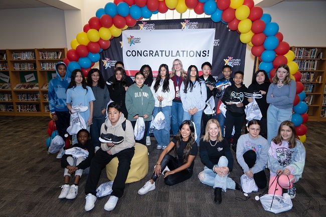 May Kane, founder Clothing Clark County, Las Vegas, with students from Cram Middle School/Photo: Courtesy May Kane