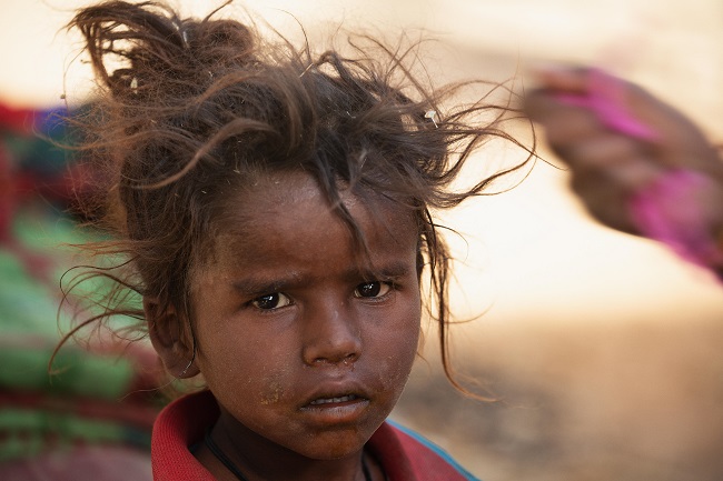 Dusty Tears photo by global photographer Mimo Khair in her book Facing Future: Portraits of Resilient Children